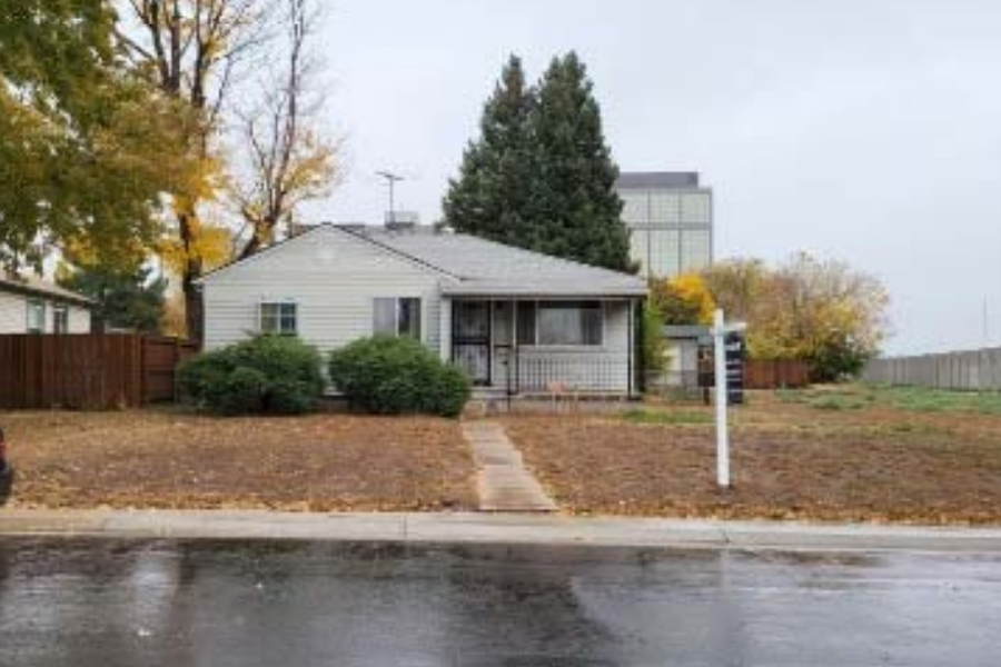 Before front exterior of Denver fix and flip property