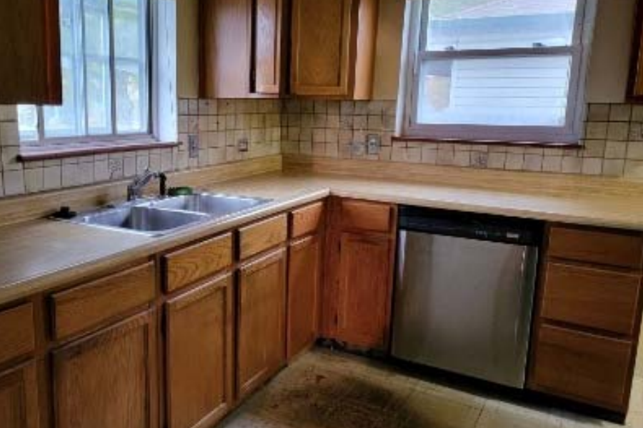 Kitchen before rehab in Denver, Colorado property